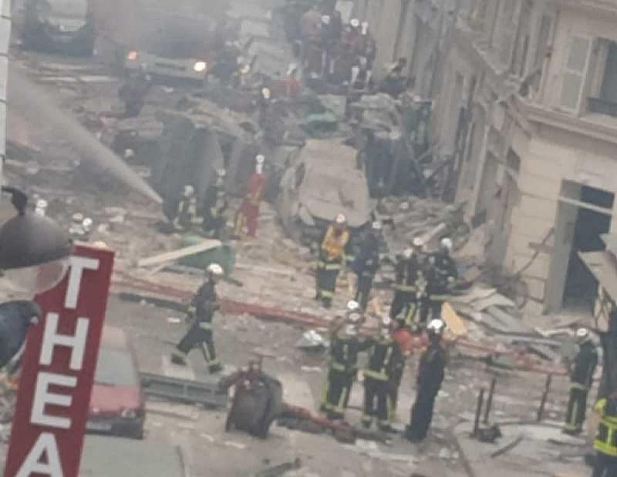 Images posted on Twitter showed debris covering the street and the lower part of the building blown out and on fire. (Image tweeted by @woodinhyo)