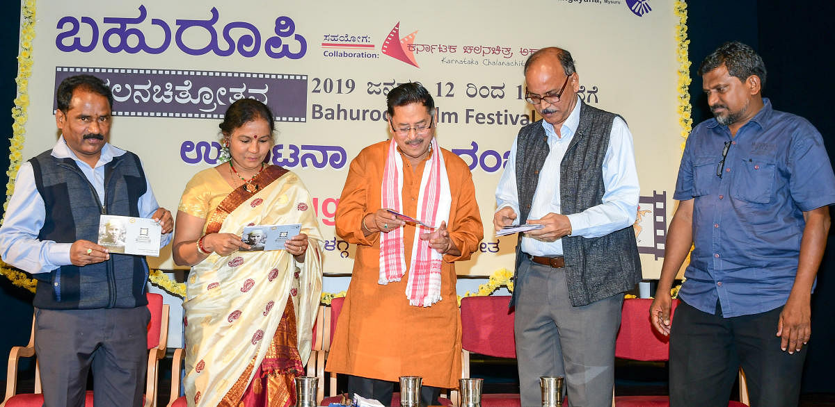 Grand opening: Film critic N Vidyashankar releasing a brochure during the inauguration of the Film Festival, organised as part of Bahuroopi National theatre festival-2019, at Bhoomigeetha in Mysuru, on Saturday. Actor Ramesh Bhat, Joint Director of Rangay