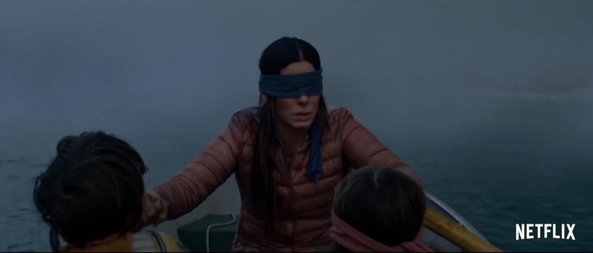 The apocalyptic Sandra Bullock thriller on Netflix is causing many viewers to take up the #BirdBoxChallenge and go about their daily activities blindfolded.