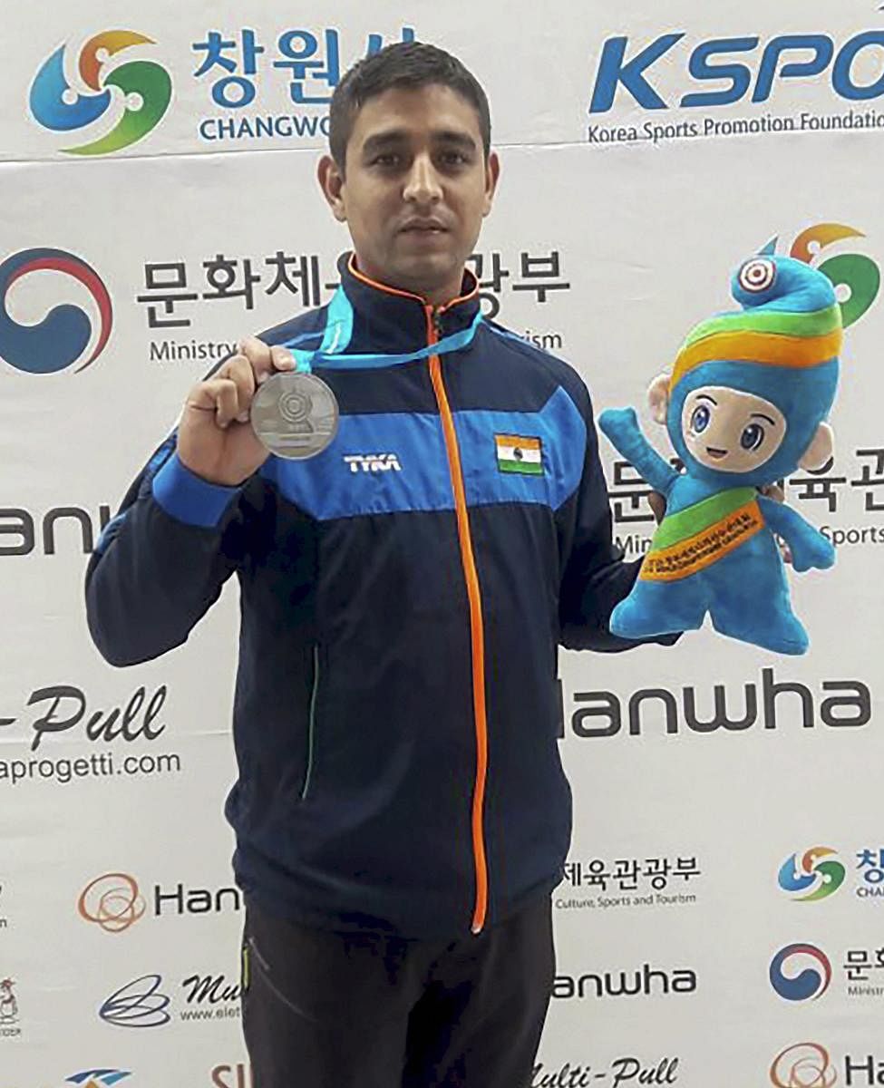 India's shooter Shahzar Rizvi poses after winning the silver medal in the 10m Air Pistol event at the ISSF World Cup in Changwon, South Korea on Tuesday. PTI