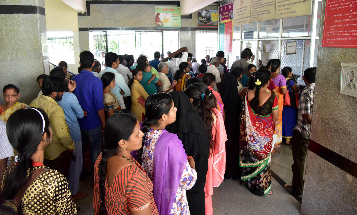 People approached government hospital due to unavailability of private hospital services as part of Belagavi Chalo, at K C Genaral Hospital, Malleshwara, in Bengaluru on Monday. Photo/ B H Shivakumar
