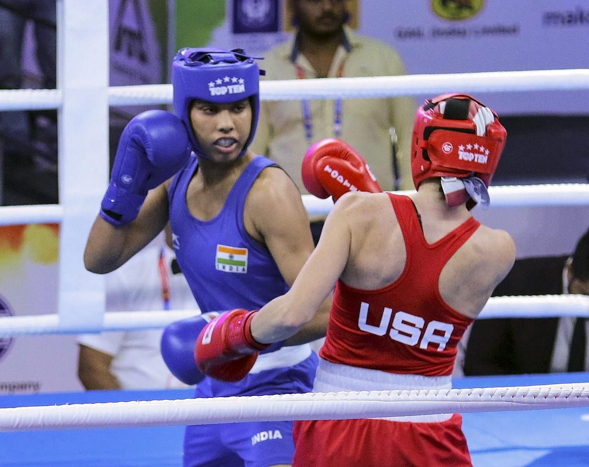 India's Manisha Moun (left) attempts to land a blow on Christina Cruz during their 54kg bout on Friday. PTI