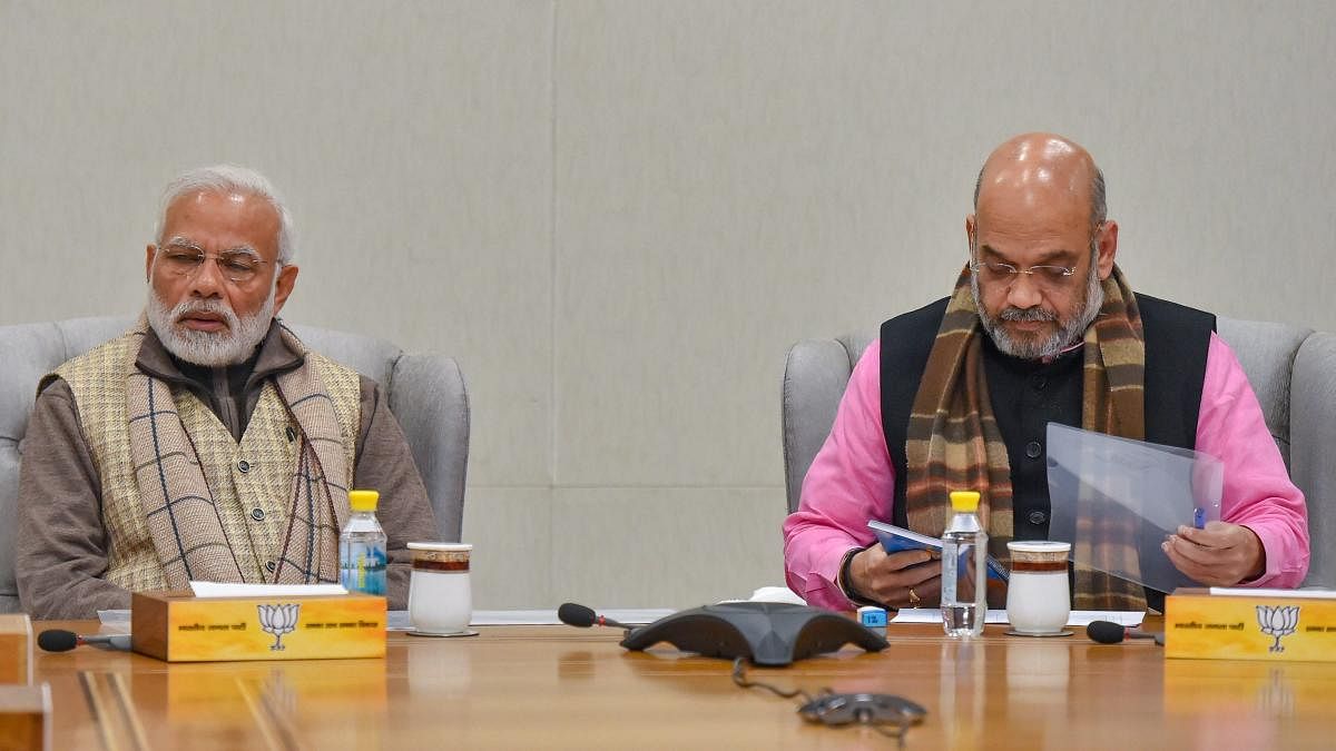 Prime Minister Narendra Modi and BJP president Amit Shah during the BJP Parliamentary Board meeting after recent Assembly election results in New Delhi on Thursday. PTI