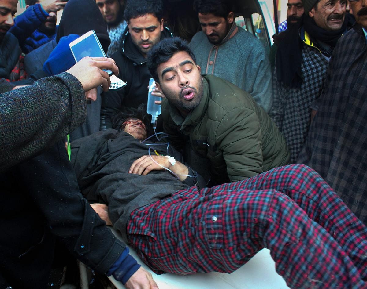 An injured civilian arrives for treatment, at SMHS hospital in Srinagar on Sunday, Jan 13,2019. Many civilians got injured in clashes at Shopian which erupted during the funeral of Commander-in-Chief of Al-Badar militant outfit Zeenat-ul-Islam. (PTI Photo