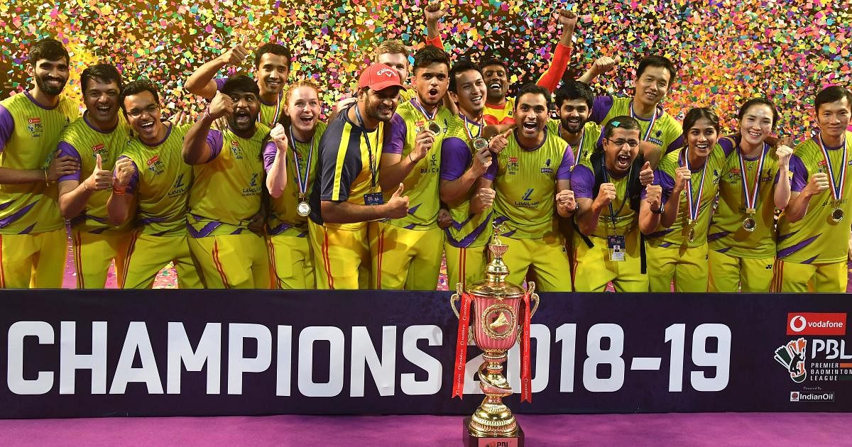 Bengaluru Raptors celebrate after winning the Premier Badminton League at the Sree Kanteerava Indoor stadium in Bengaluru on Sunday. DH Photo/ Srikanta Sharma R