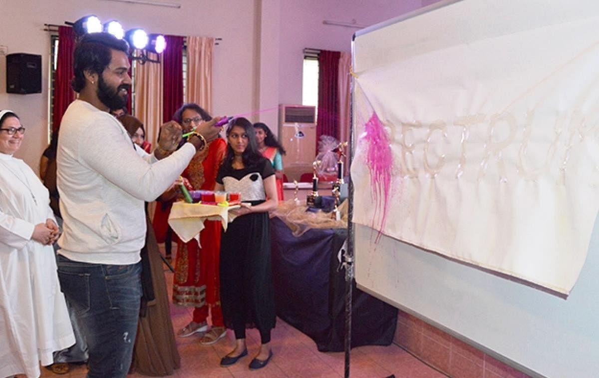 Actor Arjun Kapikad inaugurates the National level short film festival 'Spectrum' organised by St Agnes College in Mangaluru on Sunday. College principal Sr Dr Jeswina looks on.