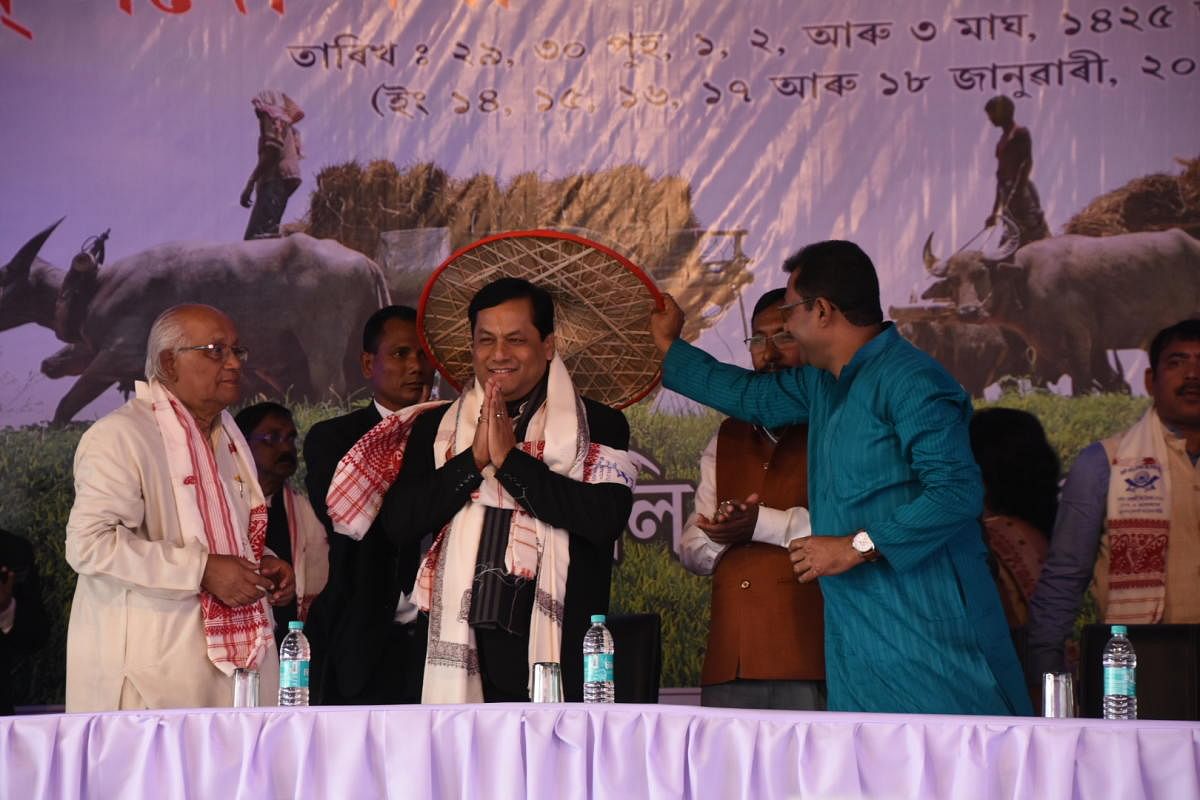 Sonowal at a Bihu function in Nagaon district on Tuesday. Photo credit: Assam government.