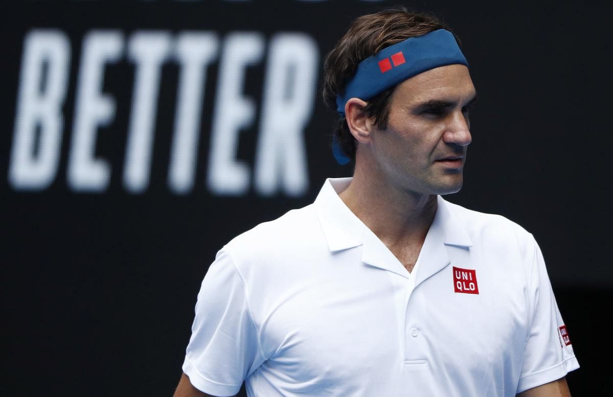 Australian Open - Second Round - Melbourne Park, Melbourne, Australia, January 16, 2019. Switzerland's Roger Federer reacts during the match against Britain's Dan Evans. REUTERS