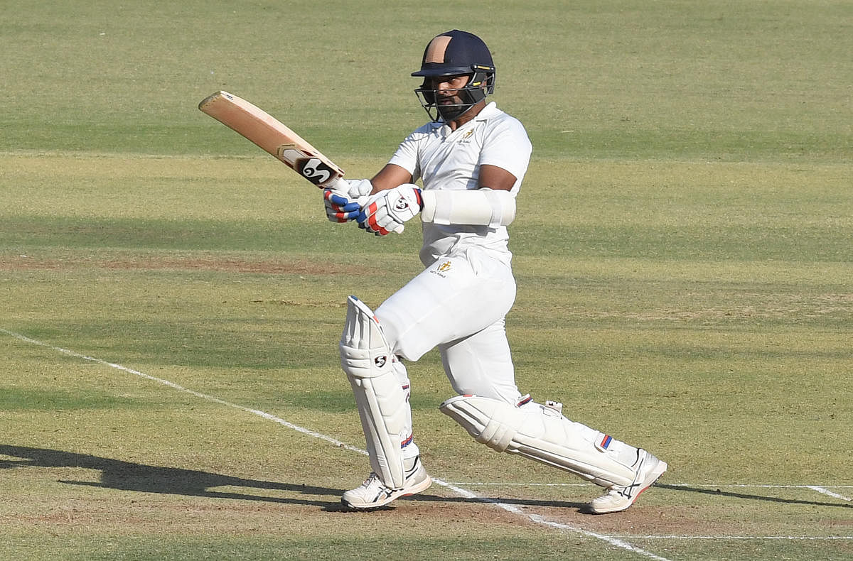 Karnataka's R Vinay Kumar pulls one en route his unbeaten 83 against Rajasthan on the second day of their Ranji Trophy quaterfinal at the M Chinnaswamy Stadium in Bengaluru on Wednesday. DH Photo/ Srikanta Sharma R