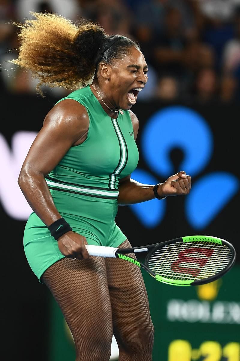 The US' Serena Williams reacts after winning a point against Canada's Eugenie Bouchard during their women's singles match in Melbourne on Thursday. AFP