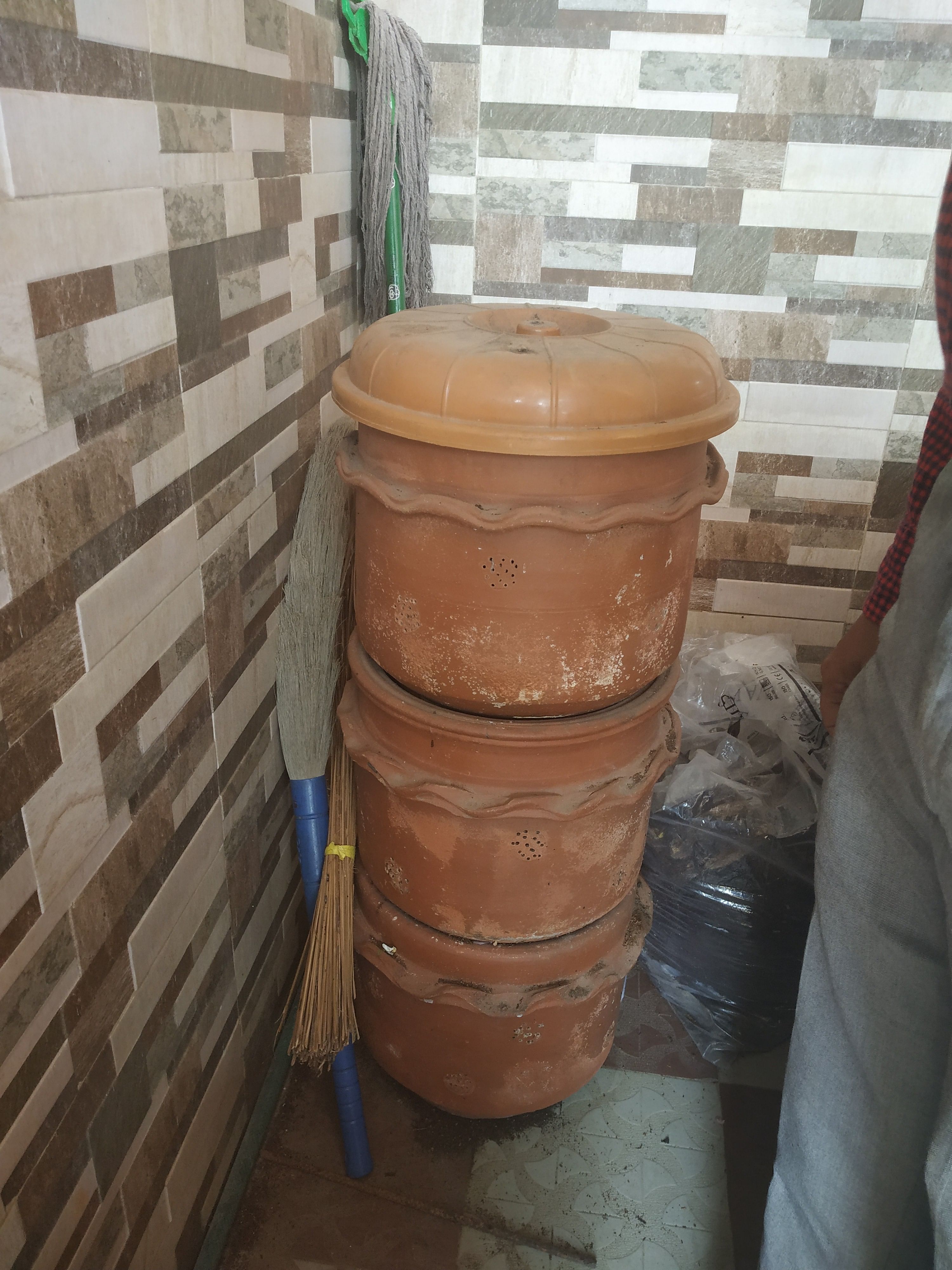 A clay composting bin at Dr Venugopal’s house.