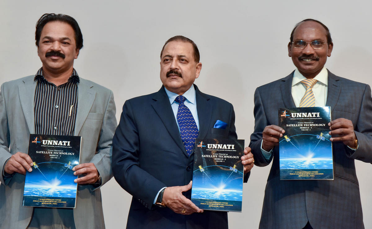 Dr Jitendra Singh, Union Minister of State, Department of Space (centre), releases the course book during the inauguration of Unnati training programme in Bengaluru on Thursday. P Kunhi Krishnan, Director, URSC and K Sivan, chairman, Isro, are also seen. 