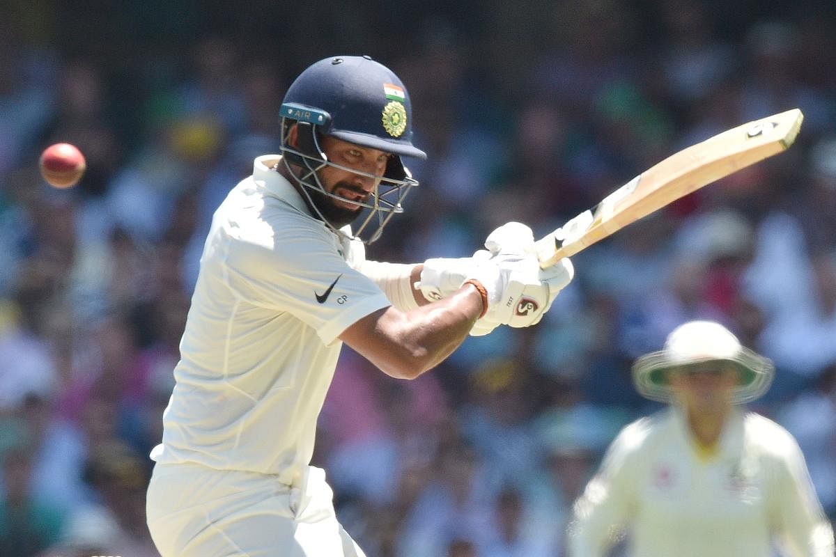 VITAL KNOCK: Cheteshwar Pujara slammed an unbeaten 67 in Saurashtra's record chase against Uttar Pradesh in Lucknow on Saturday. AFP File Photo