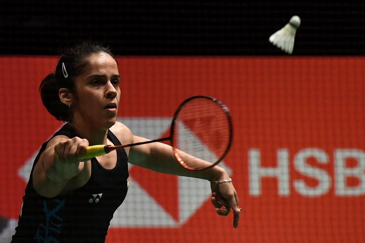 BOWS OUT: Saina Nehwal of India returns during her straight-game defeat to Carolina Marin in the semifinals of the Malaysia Masters badminton tournament in Kuala Lumpur on Saturday. AFP
