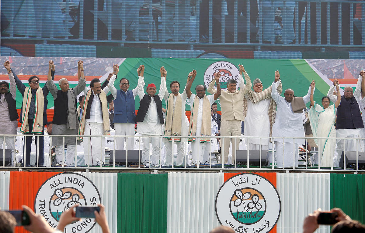 Leaders of India's main opposition parties join their hands together during "United India" rally ahead of the general election, in Kolkata, India, January 19, 2019. REUTERS