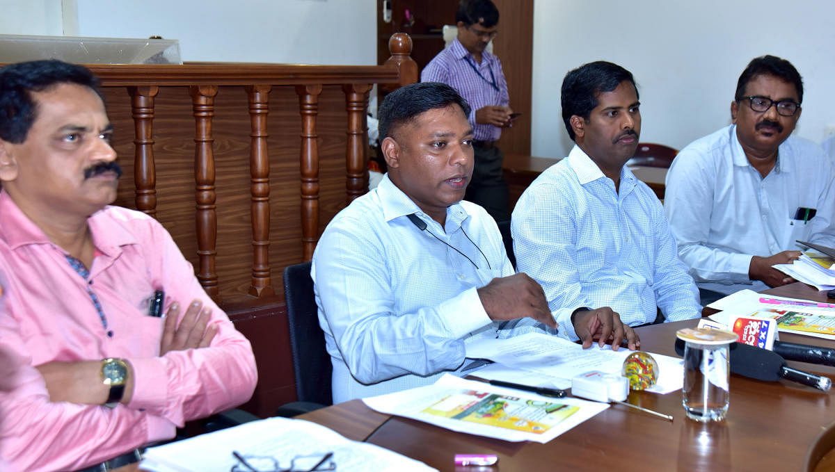 Deputy Commissioner Sasikanth Senthil addresses a press meet in Mangaluru on Wednesday.