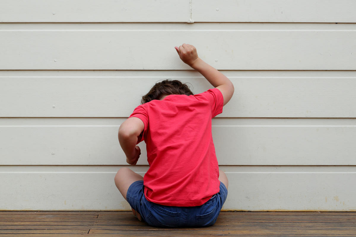 Child throwing a tantrum.