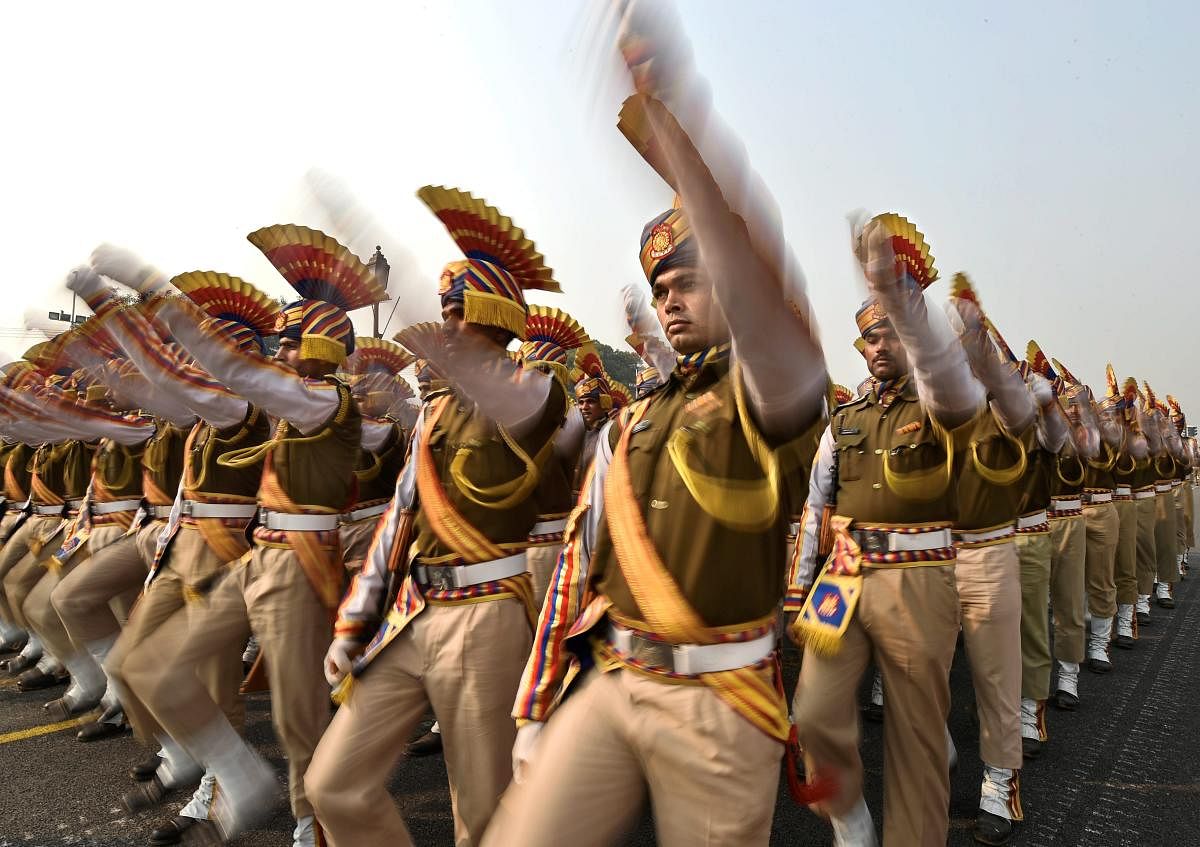 Central Reserve Police Force (CRPF) personnel march during the rehearsals for the upcoming Republic Day parade 2019 on a cold morning, at Rajpath in New Delhi. PTI File photo