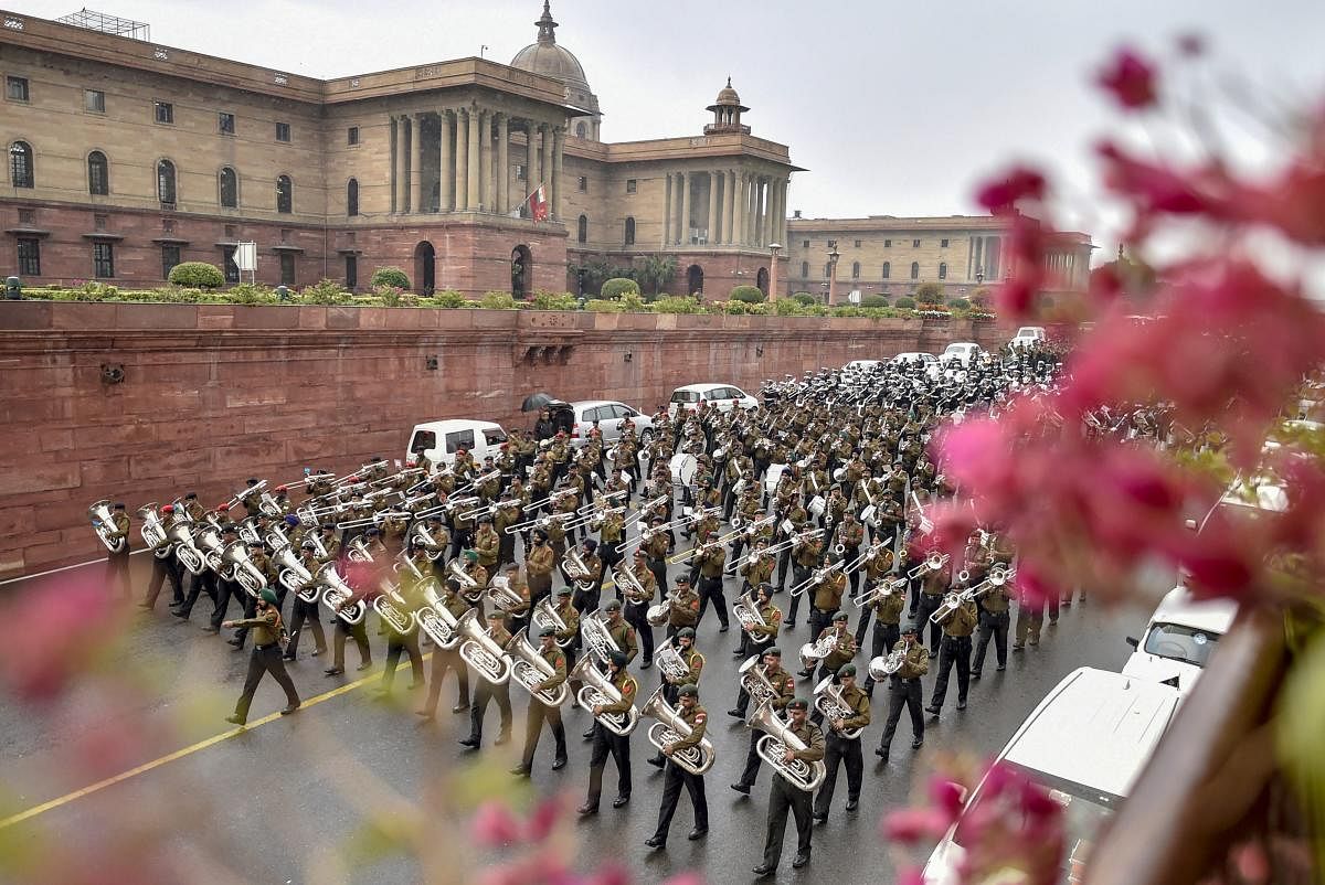 Tri-services bands rehearse for the Beating Retreat ceremony, in New Delhi. PTI