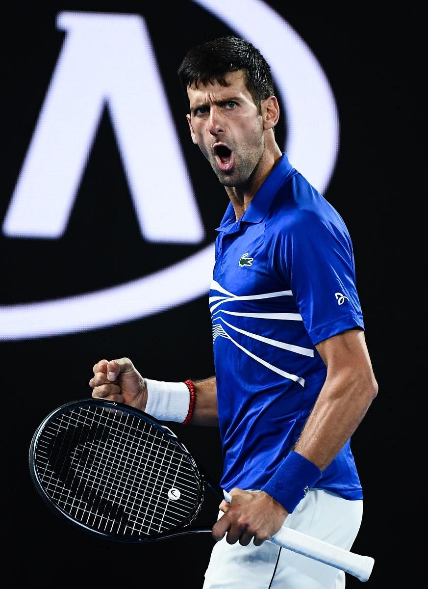 WINNER'S ROAR: Serbia's Novak Djokovic reacts after a point against France's Lucas Pouille during their semifinal on Friday. AFP