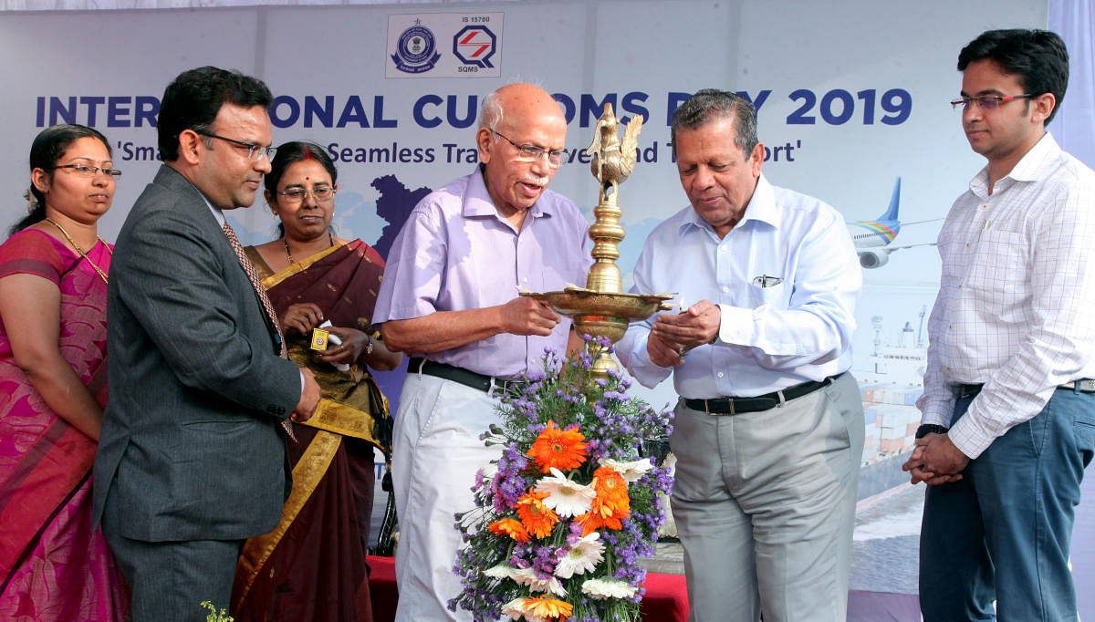 MAHE former VC Prof B M Hegde and Nitte University Chancellor N Vinaya Hegde inaugurate the International Customs Day programme organised on the premises of New Customs House in Panambur on Friday. Imamuddin Ahmed, additional commissioner, Mangalore Custo