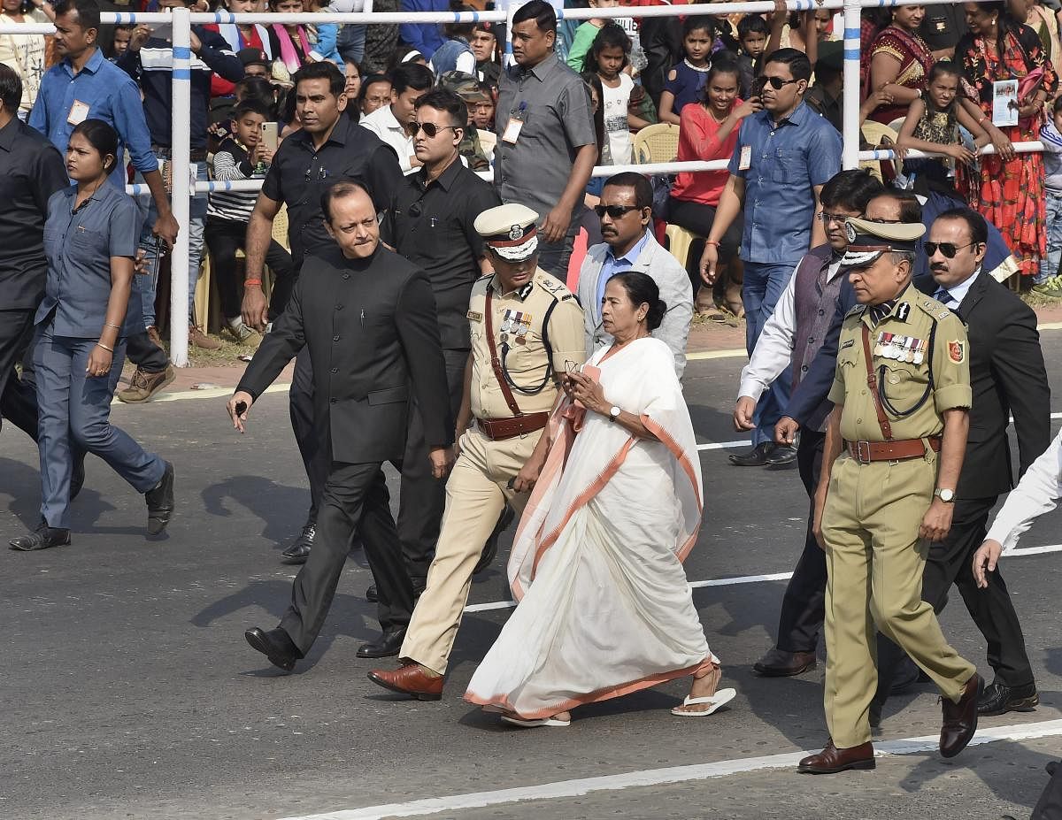 West Bengal Chief Minister Mamata Banerjee arrives to attend the 70th Republic Day celebrations at Red Road, in Kolkata, Saturday. PTI photo