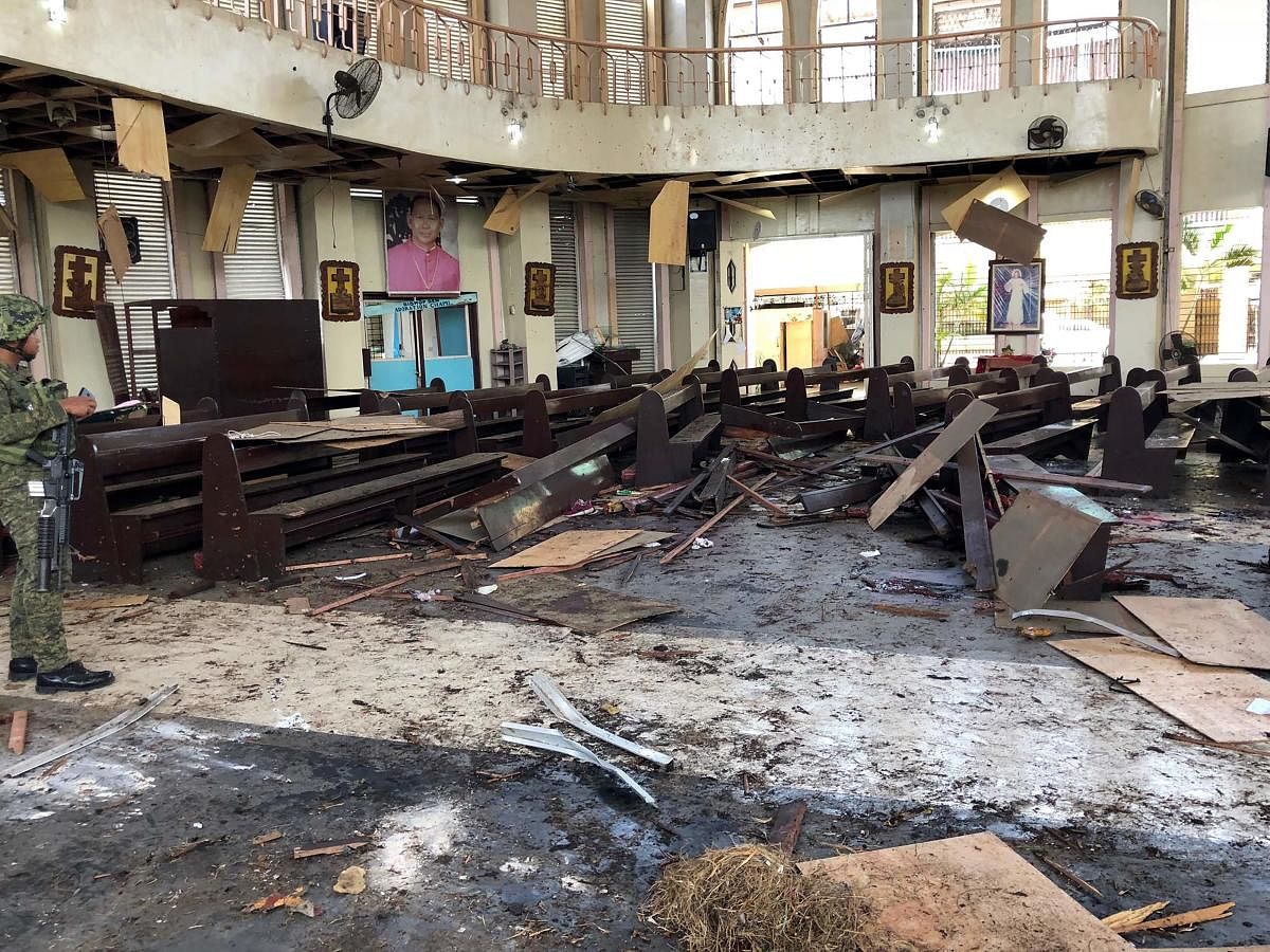  Debris inside a Catholic Church where two bombs exploded in Jolo, Sulu province on the southern island of Mindanao. AFP photo
