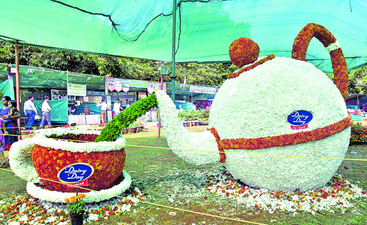 A model of a kettle and a tea cup made of flowers at the floricultural and horticultural exhibition organised by Department of Horticulture, Zilla Panchayat and Siri Totagarike Sangha at Kadri Park in Mangaluru on Saturday.