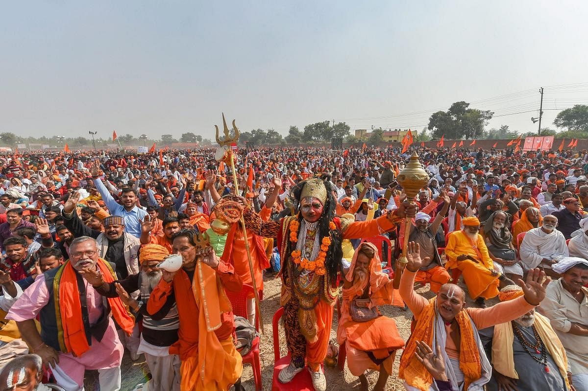 Supporters participate in`Dharam Sabha’, being organised by the Vishwa Hindu Parishad to push for the construction of the Ram temple. PTI file photo. 