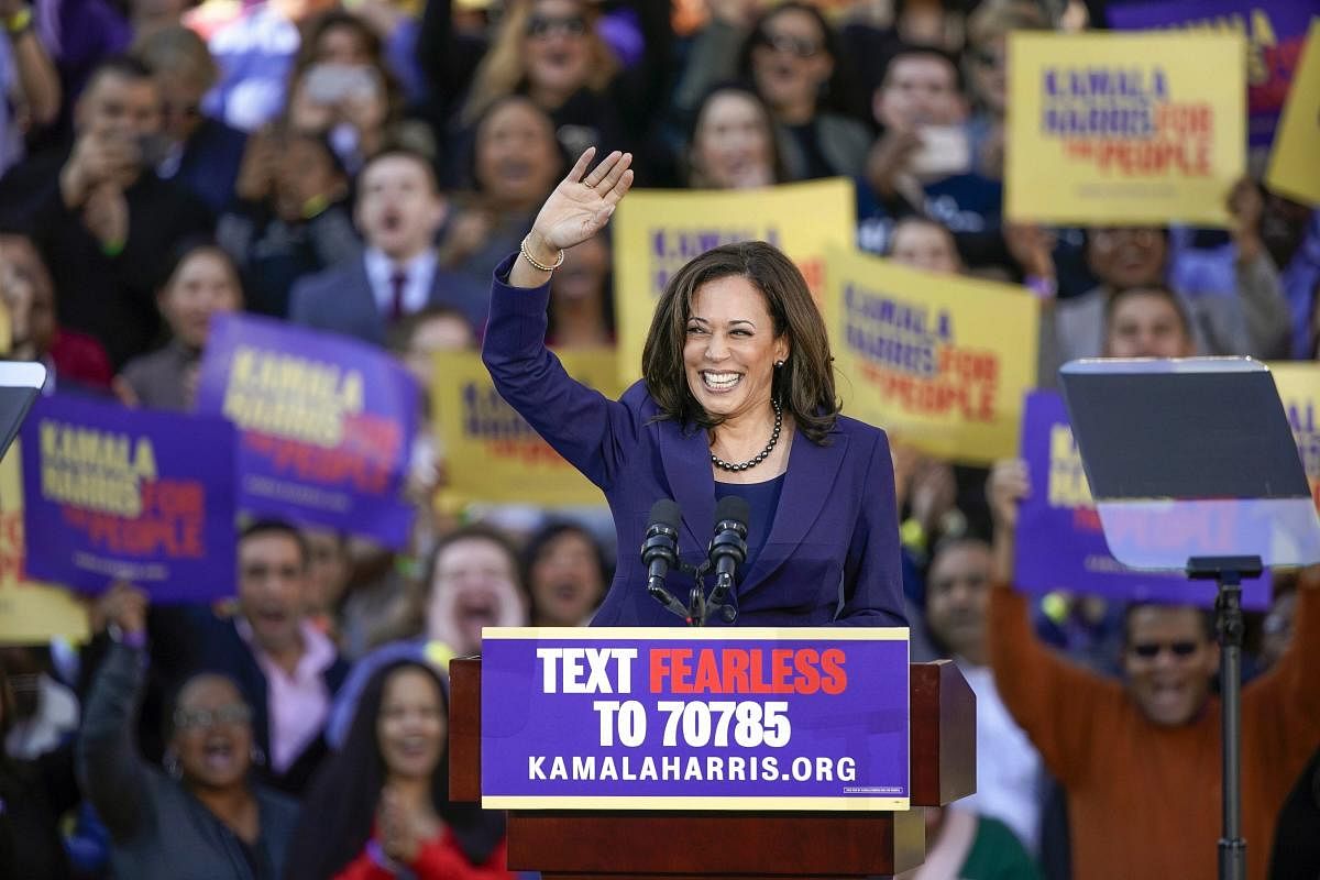 Democratic Sen. Kamala Harris, of California, waves to the crowd as she formally launches her presidential campaign at a rally in her hometown of Oakland, California. AP/PTI