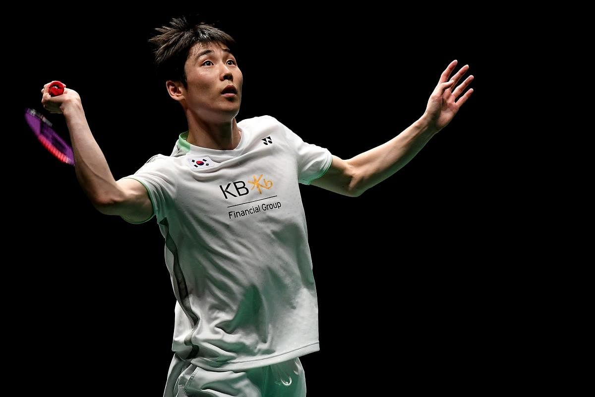 South Korea's Son Wan-ho returns during his win over Chen Long of China on Sunday. AFP