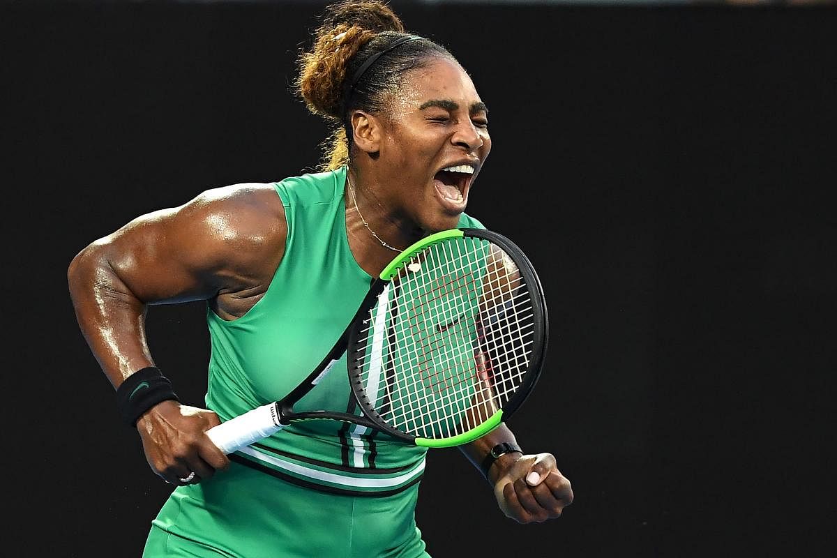 Serena Williams is all charged up during her fourth-round win over Simona Halep on Monday. AFP 
