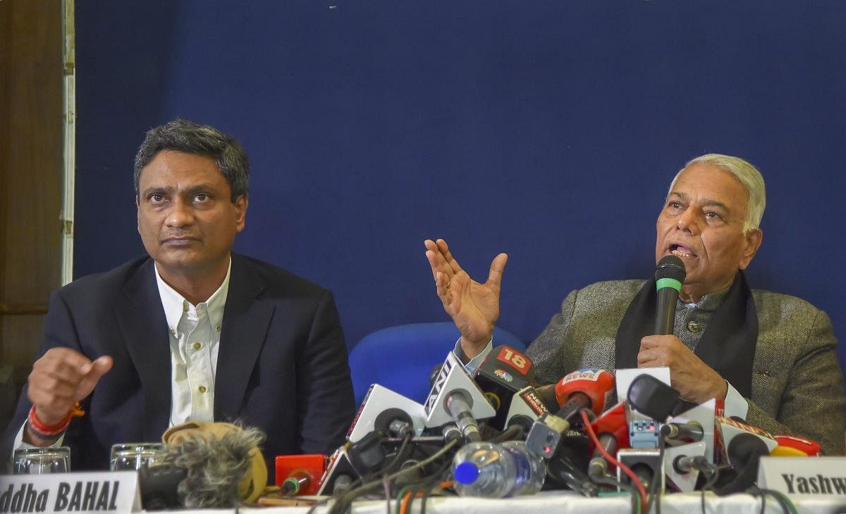 Former Union minister Yashwant Sinha speaks at a press conference regarding an alleged financial scam by the non-banking financial company DHFL, at Press Club of India, New Delhi. Aniruddha Bahal, the founder of Cobrapost is also seen. (PTI Photo)