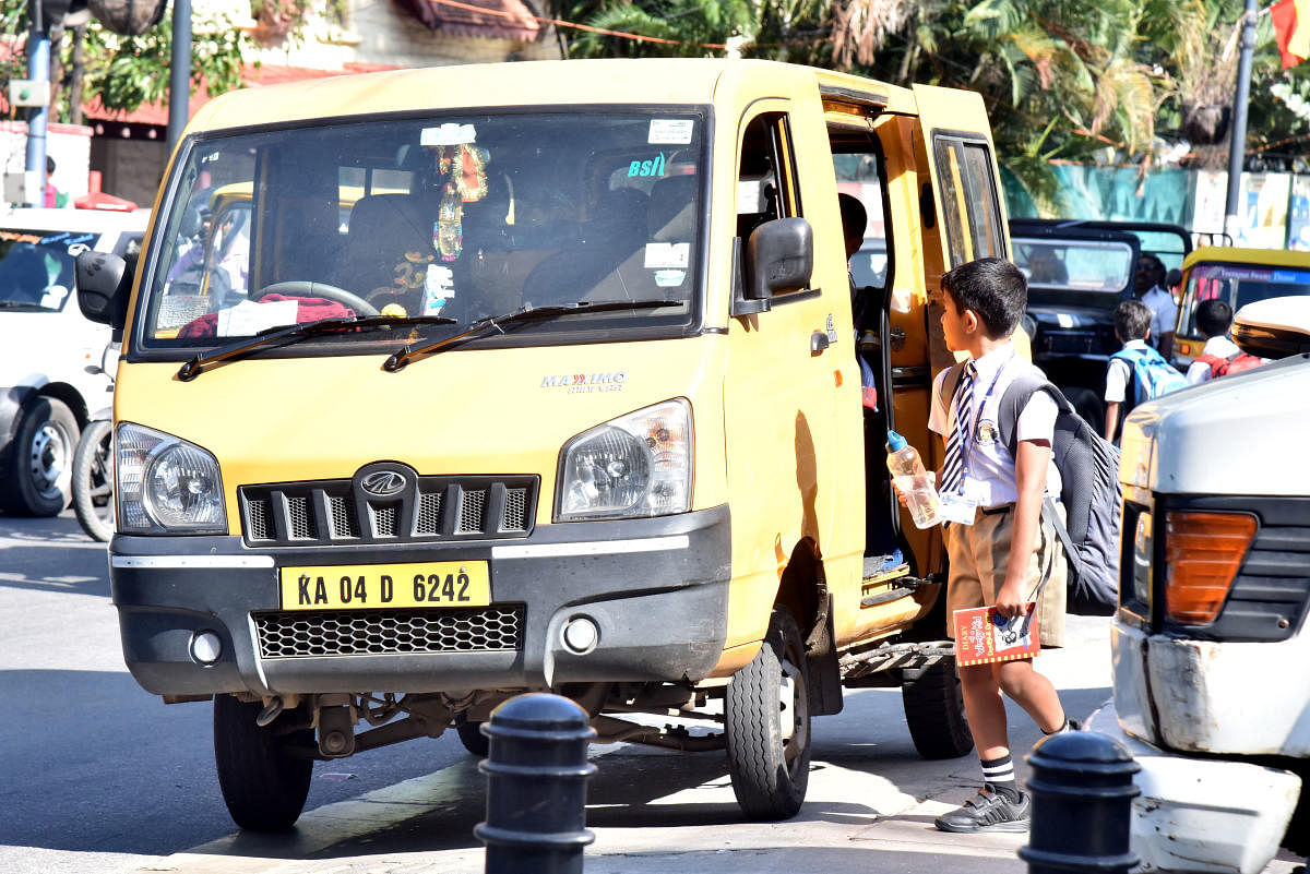 School van on Museum Road in Bengaluru. DH Photo/Janardhan B K