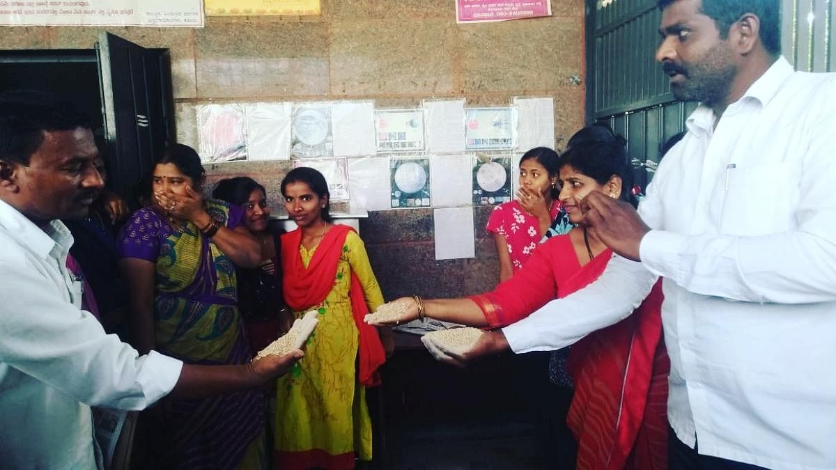 Taluk Panchayat president Bharati Prahlad and member Jiganehalli Manju found worm- infested grains, in the kitchen of BCM post-matric girls hostel in Kadur, during their inspection.