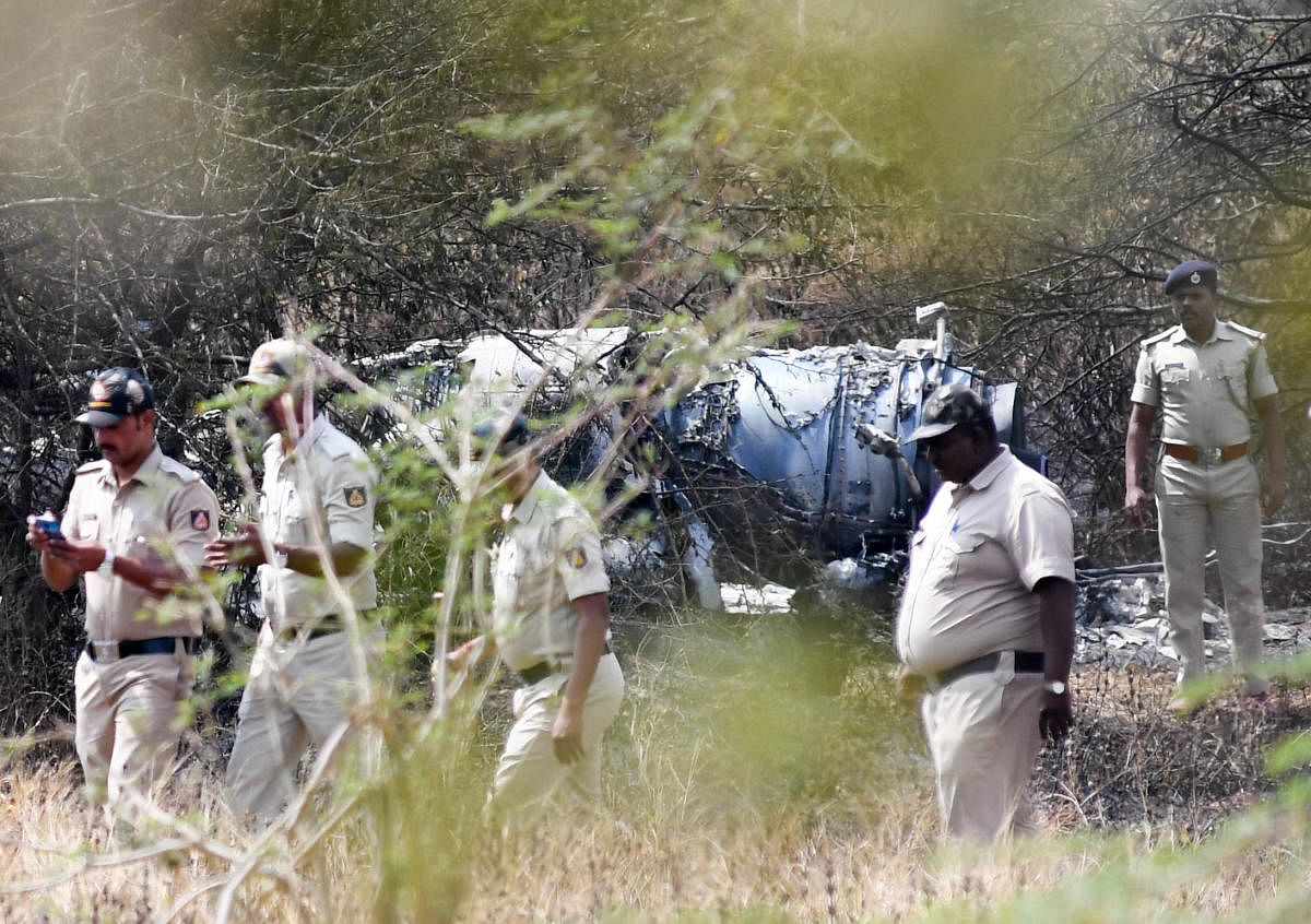 Defence Officials are inspecting the spot where the wreckage of the Mirage-2000 fighter aircraft after it crash landed, at HAL airport runway, soon after take-off for a training sortie in Bengaluru on Friday, Photo/ B H Shivakumar