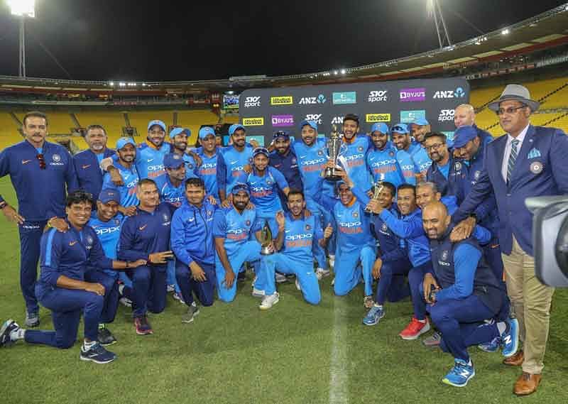 India's players celebrate with the series trophy after beating New Zealand in the fifth one day international at Westpac Stadium in Wellington, New Zealand.  (AP/PTI Photo)