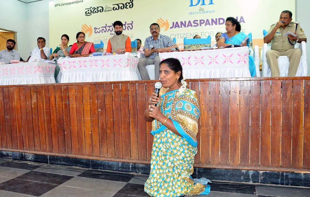 A differently abled woman airs her grievances during ‘Janaspandana’ programme organised by Prajavani and Deccan Herald at Brahma Samudra Shri Ranganna Kalyana Mantap on Basavanahalli Main Road in Chikkamagaluru on Saturday.