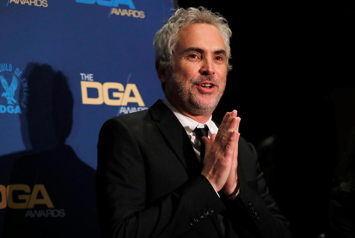 Alfonso Cuaron, director of "Roma" poses after winning the Feature Film category at the Directors Guild Awards in Los Angeles, California. (Reuters Photo)