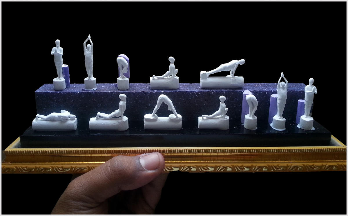 A chalk carving of the asanas in Surya Namaskar