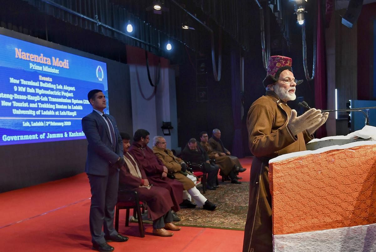 Prime Minister Narendra Modi addresses a gathering during a function, in Leh region of Jammu and Kashmir. (PIB Photo via PTI)