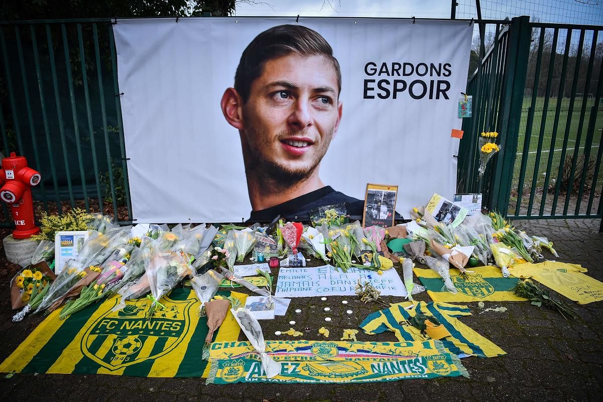 TRIBUTE: Flowers put in front of the entrance of the training center La Joneliere in La Chapelle-sur-Erdre on January 25, four days after the plane of Emiliano Sala vanished. AFP