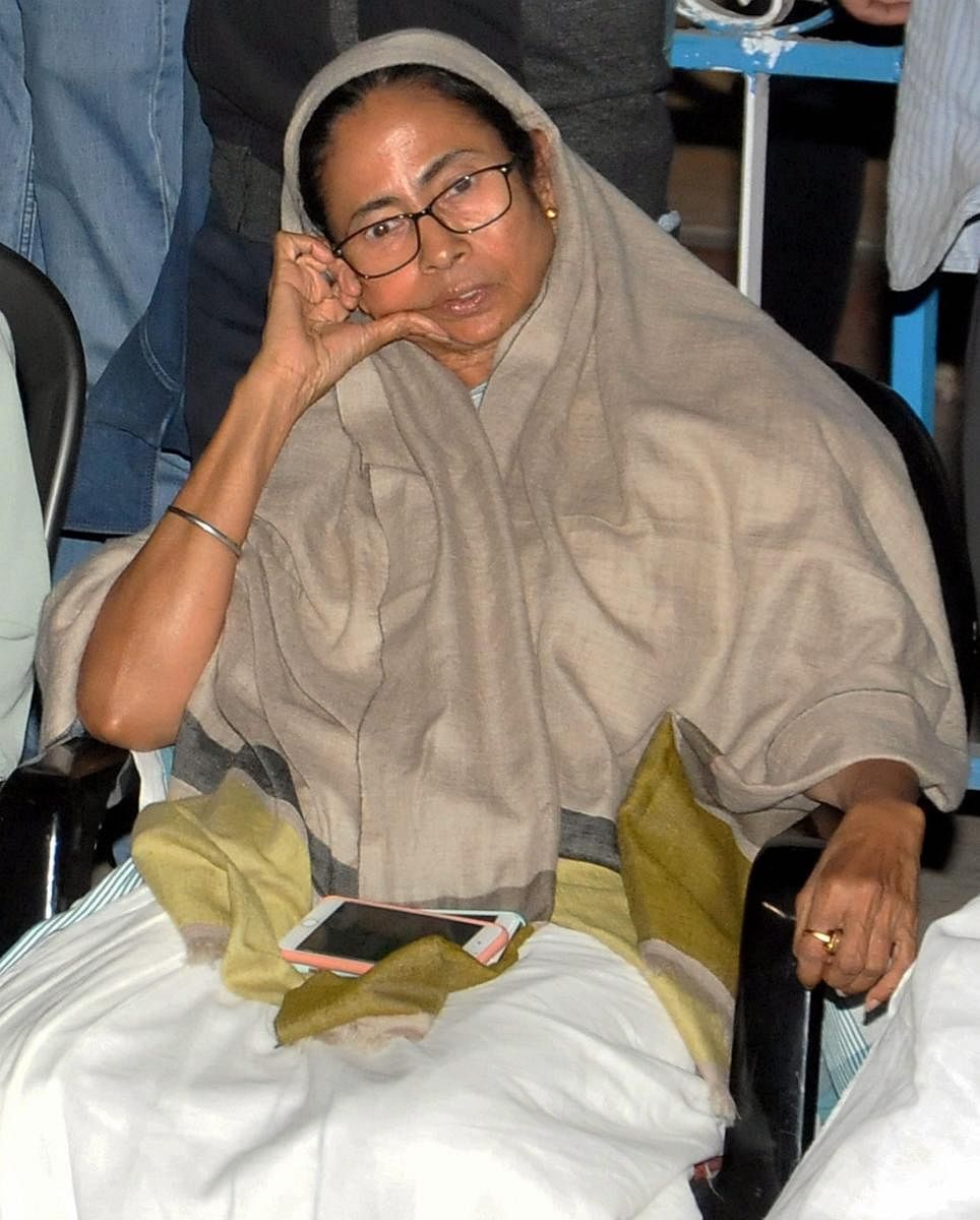 West Bengal Chief Minister Mamata Banerjee sitting on her 'Save the Constitution' dharna after CBI raids Kolkata Police Commissioner's residence in Kolkata. PTI photo.