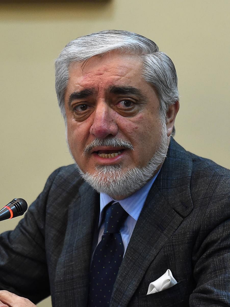 Afghan Chief Executive Officer Abdullah Abdullah looks on as he speaks during a press conference at Sapedar palace in Kabul on February 4, 2019