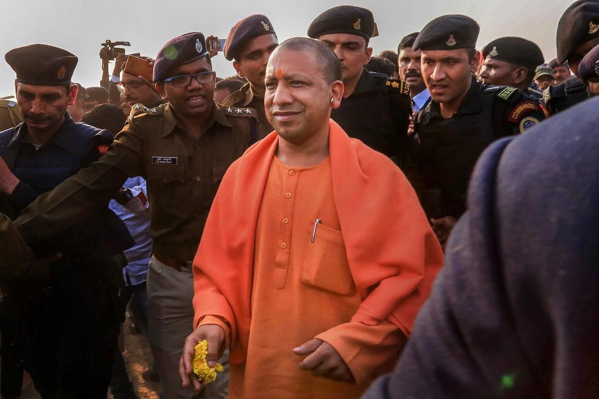 Chief Minister of Uttar Pradesh Yogi Adityanath arrives at Chas area helipad under Bokaro district of Jharkhand, Tuesday, Feb 5, 2019, to attend a rally of Bharatiya Janata Party (BJP) in Purulia district of West Bengal. The chief minister flew to Jharkhand’s Bokaro before travelling to Purulia by road due to alleged denial of permission for his landing in West Bengal. (PTI Photo)