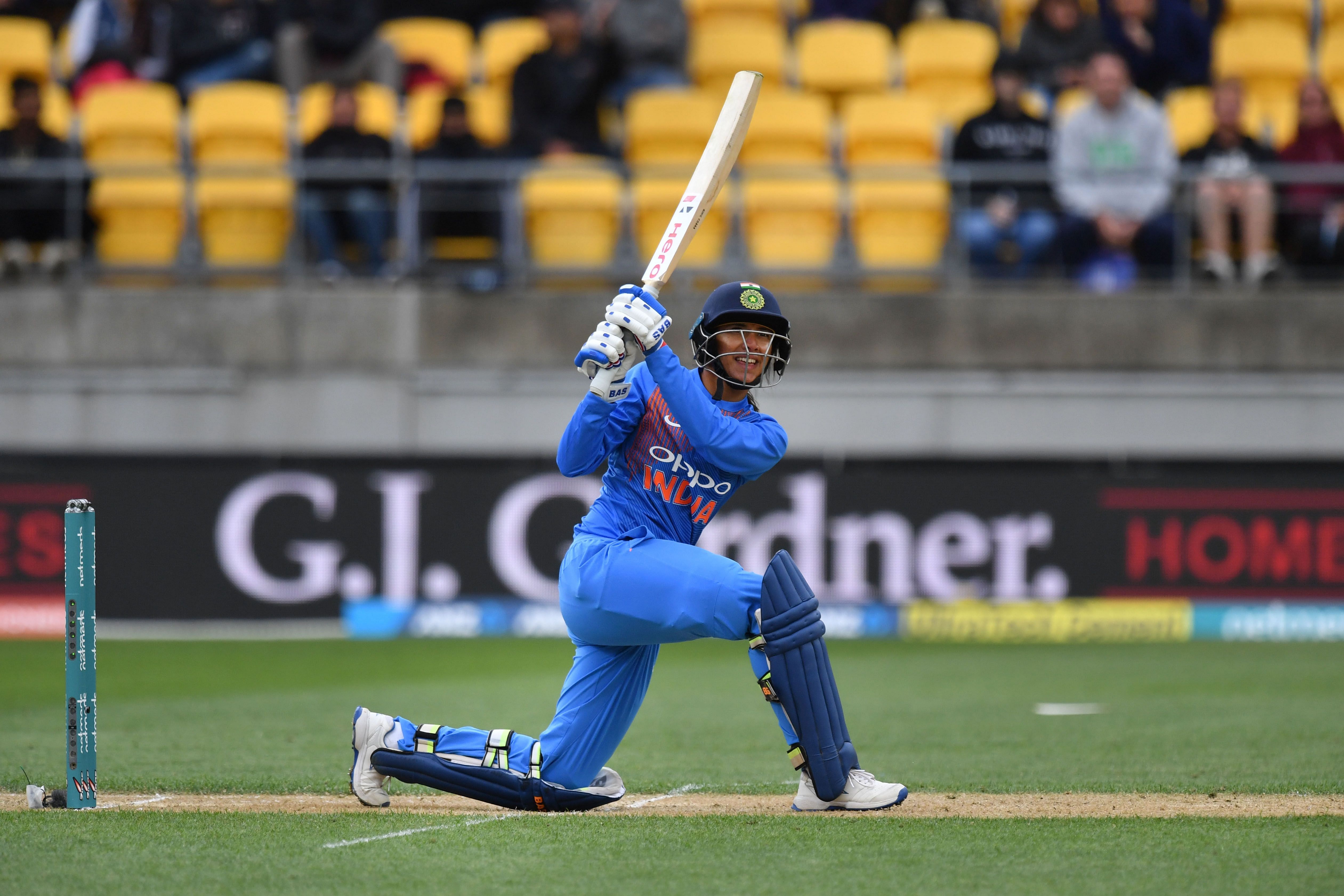 KNOCK IN VAIN: India's Smriti Mandhana sweeps one during her 34-ball 58 against New Zealand in Wellington on Wednesday. AFP