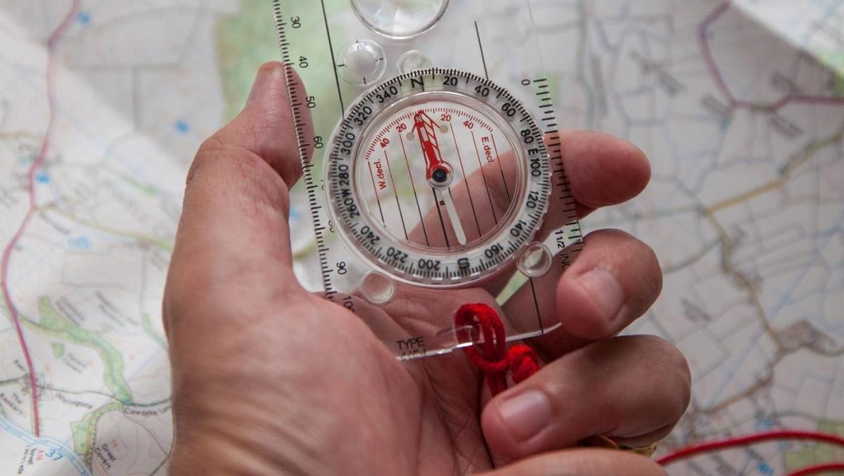 Compass pointing towards North Pole