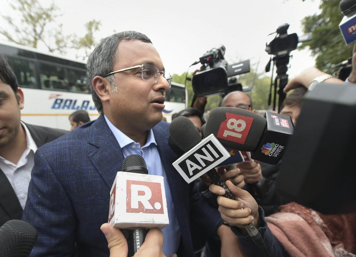 Karti Chidambaram, son of former finance minister P Chidambaram, arrives to appear before the Enforcement Directorate (ED) in connection with a money laundering case, in New Delhi on Thursday. (PTI Photo)