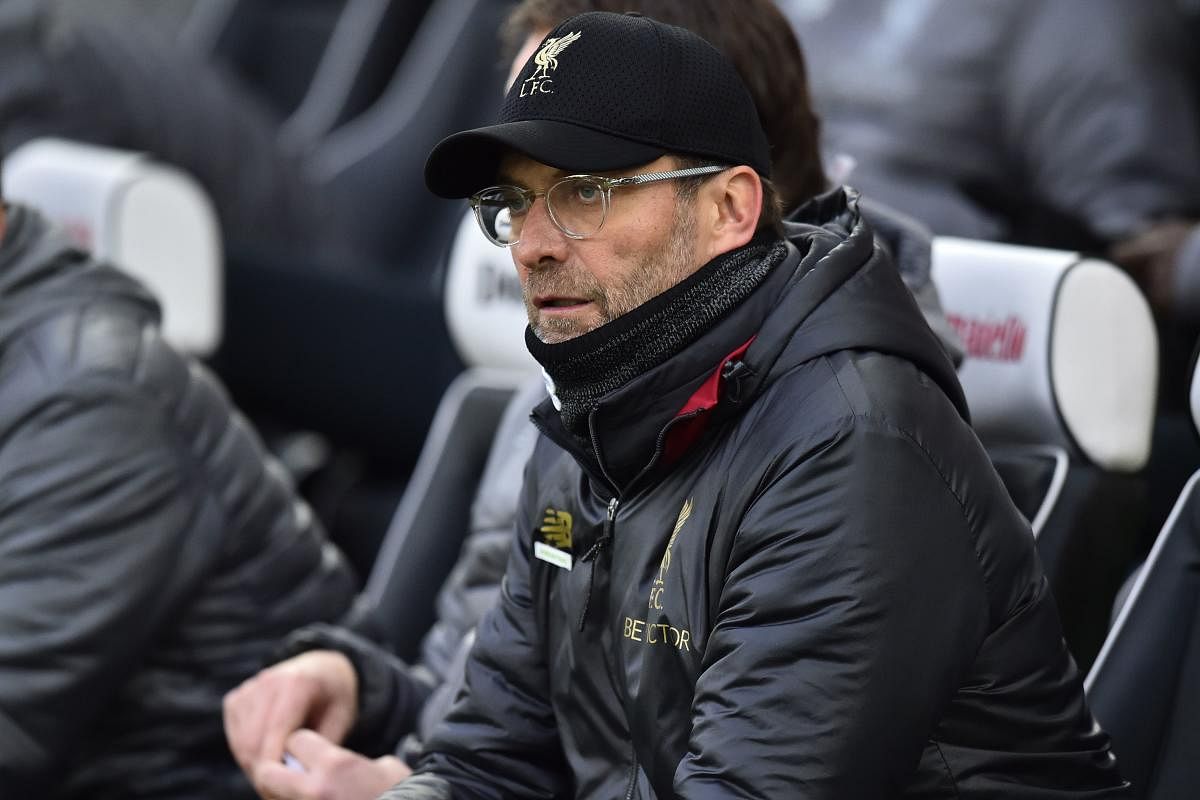 OPTIMISTIC: Liverpool coach Jurgen Klopp has urged his players to enjoy the ride and not worry about the title. AFP File Photo