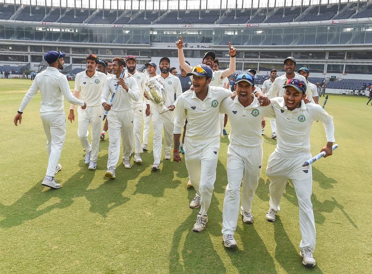 Vidarbha players celebrate after defeating Saurashtra in the Ranji Trophy final in Nagpur on Thursday. PTI